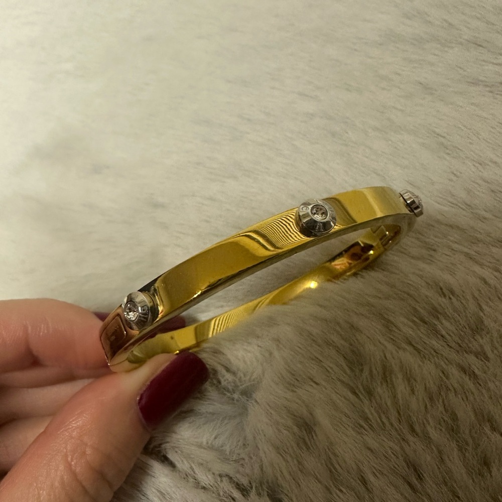 henri bendel gold tone bangle